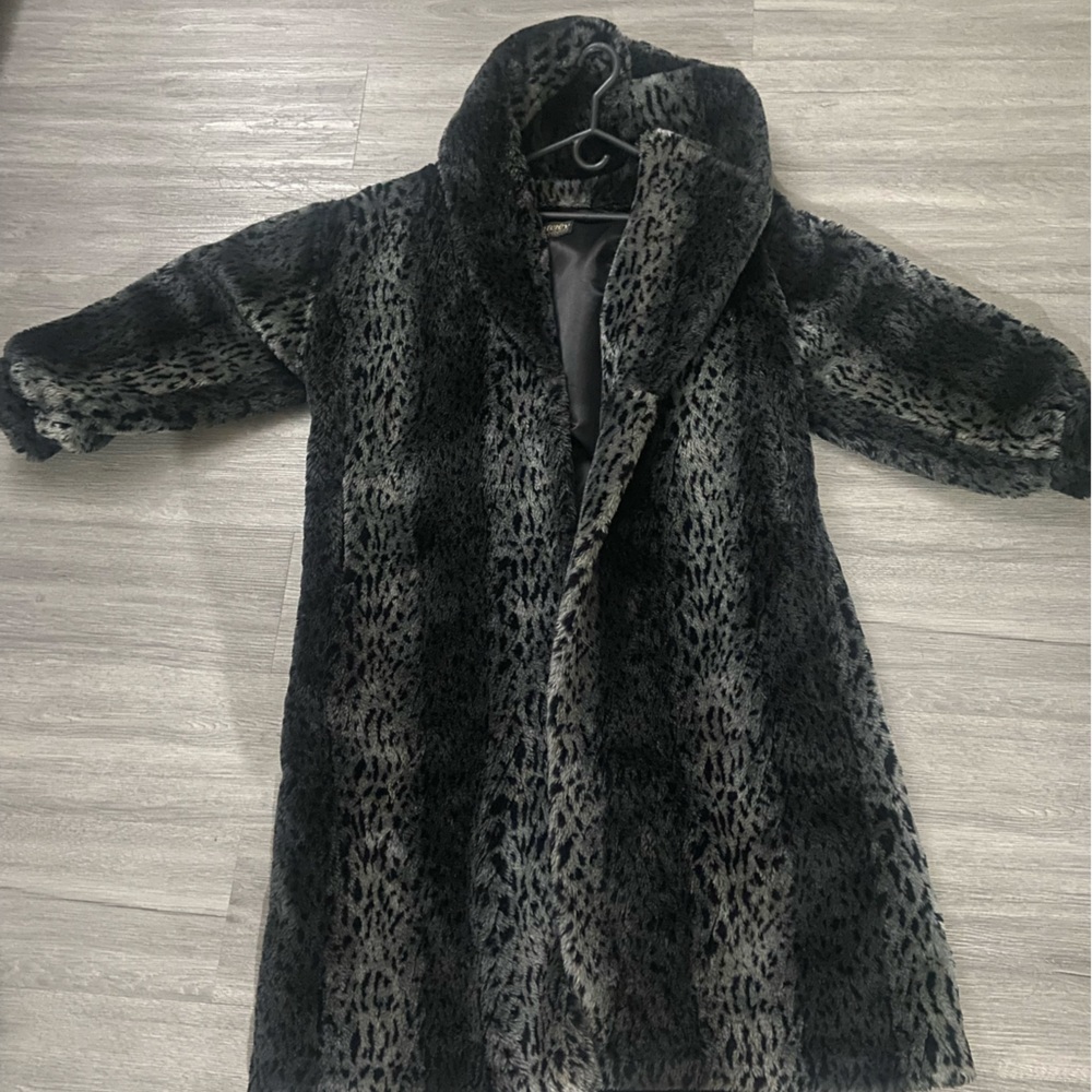 Luxury Faux Fur Coat needs to be dry cleaned.